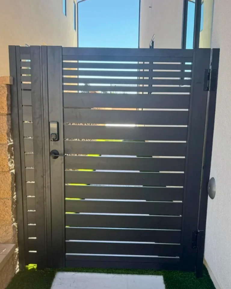 ALU40 black gate across a turf walkway