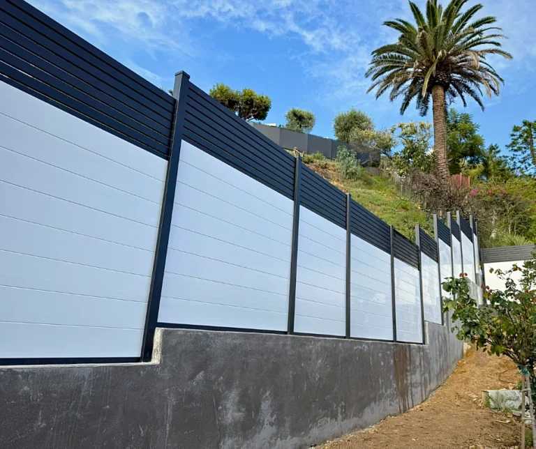 White ALU60 T&G fence with black posts and slat top