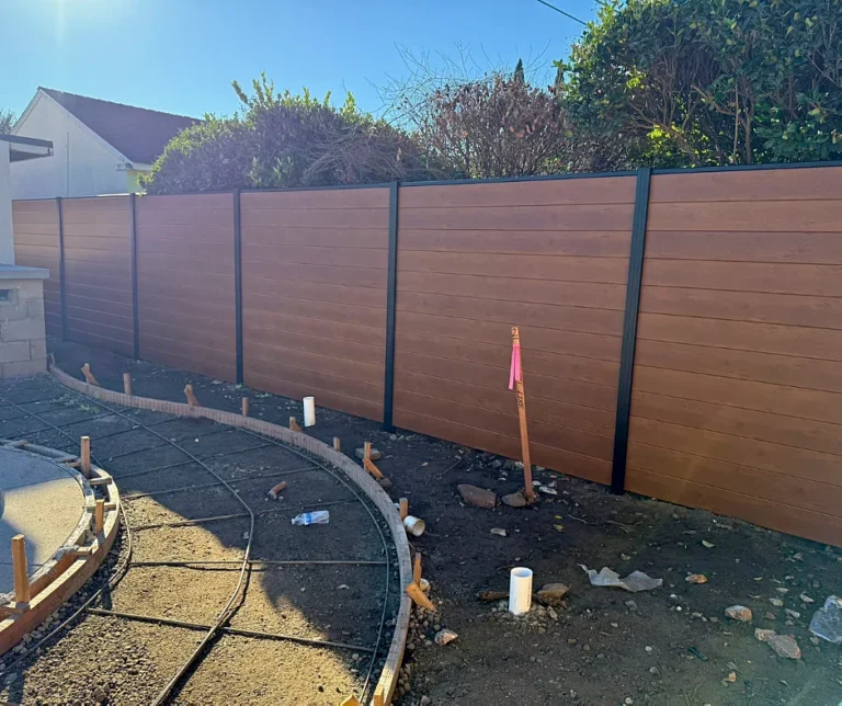 Wood grain ALU60 T&G fence before landscaping