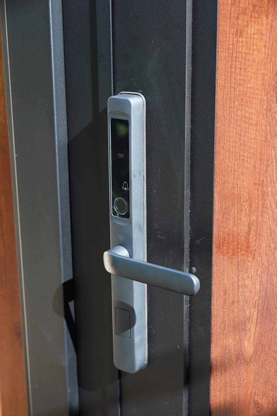 Smart lock on a woodgrain T&G gate