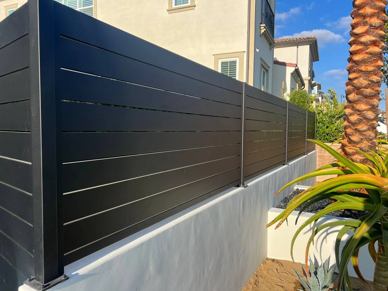 Powder-coated black aluminum fence