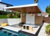 ALU FLOAT cantilever insulated patio cover over a pool area