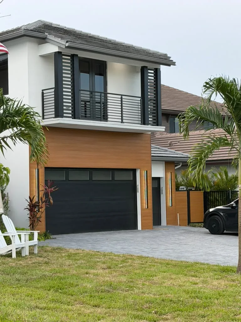 Woodgrain aluminum cladding on a home facade