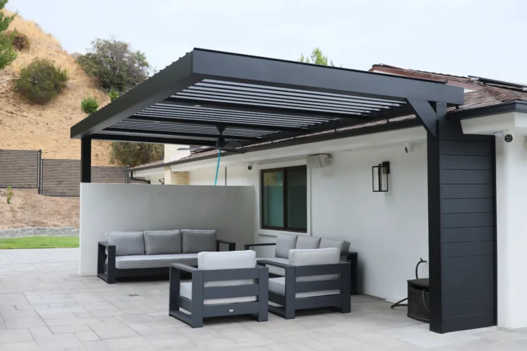 Louvered patio cover with louvers angled open