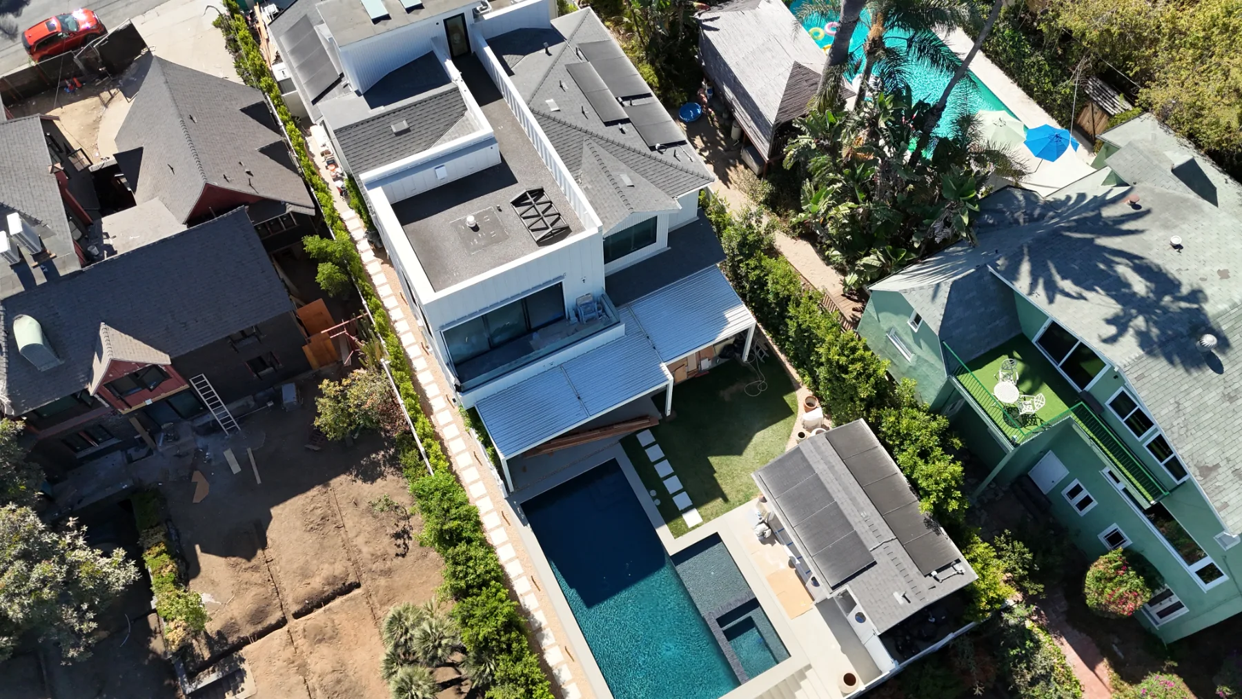 Drone view of an automatic louver patio cover by Aluglobus