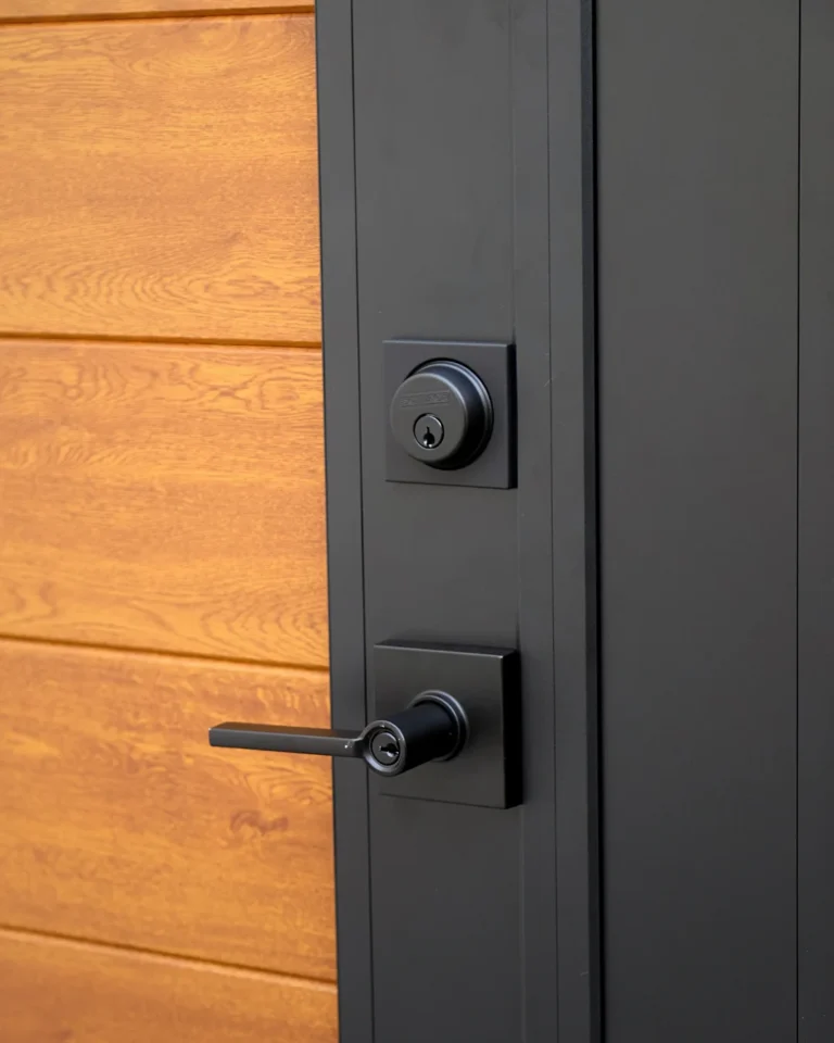 Powder-coated aluminum frame and wood grain slats with deadbolt and lever