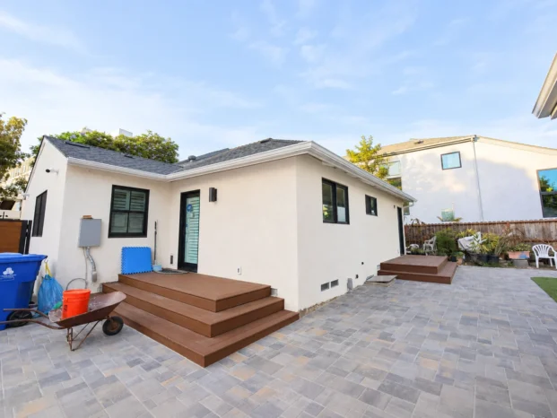 Custom insulated aluminium patio cover with black heavy duty posts installed in Westwood CA