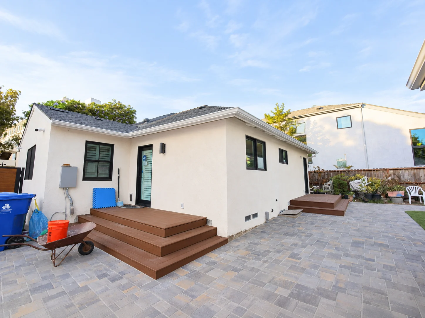 Custom insulated aluminium patio cover with black heavy duty posts installed in Westwood CA