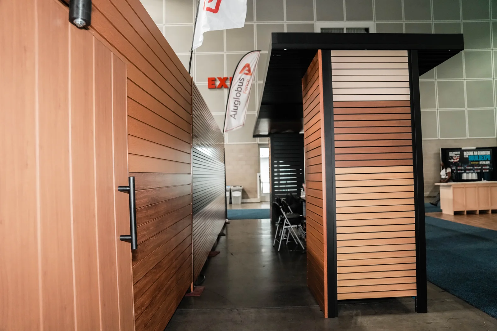 Woodgrain aluminum cladding wall with a door