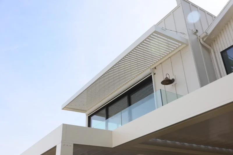 White aluminum slat roof on a modern home