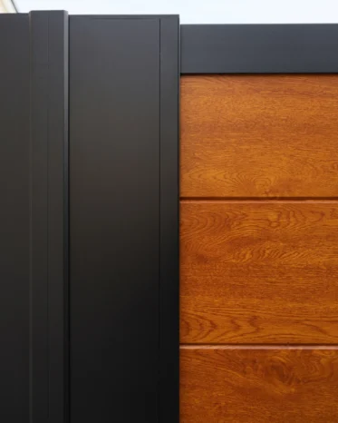 Interlocking Alu60 tongue and groove aluminum slats with warm natural woodgrain finish in Westwood.