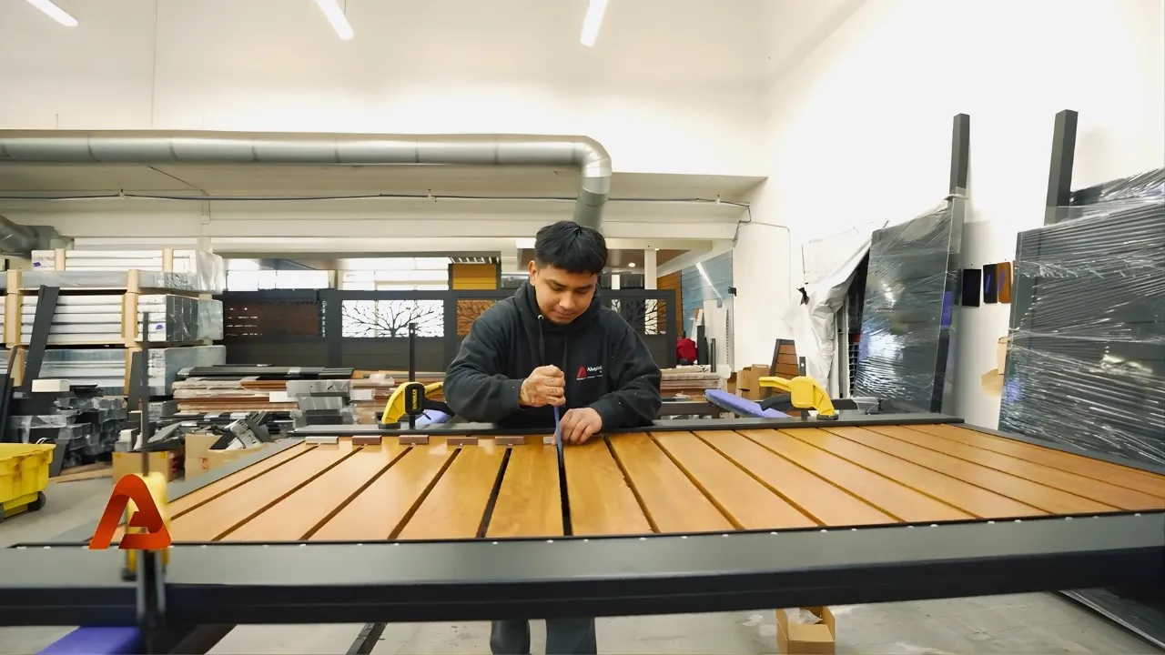 Building a custom aluminum gate in our factory